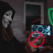 A masked scammer trying to commit online fraud by stealing credit card information but is blocked online by a store with comprehensive merchant fraud protection strategy in place