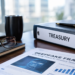 Stock photo of a desk with a “Treasury” binder, a pen, glasses, a tumbler, and a laptop, alongside a document titled “Deepfake Fraud: A Growing Threat to Treasury Teams” featuring a digital face-scan graphic and a bar chart showing incidents on the rise.